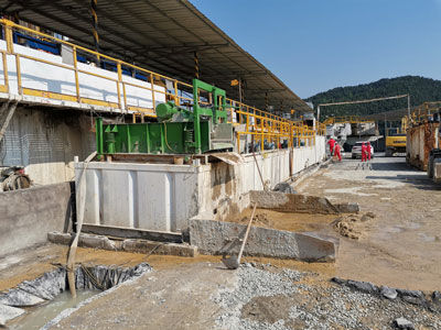 Water based mud treatment system for drilling waste management