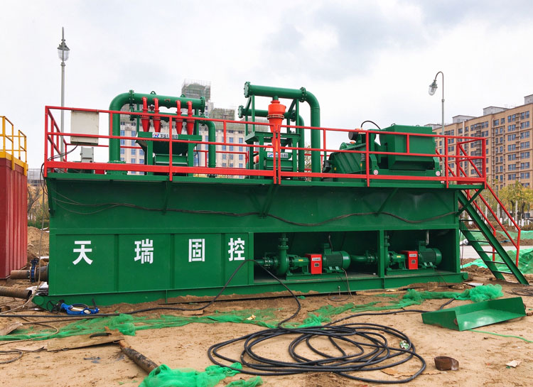 Geothermal solids control system with maintenance platform, access ladder and hydrocyclone assembly.